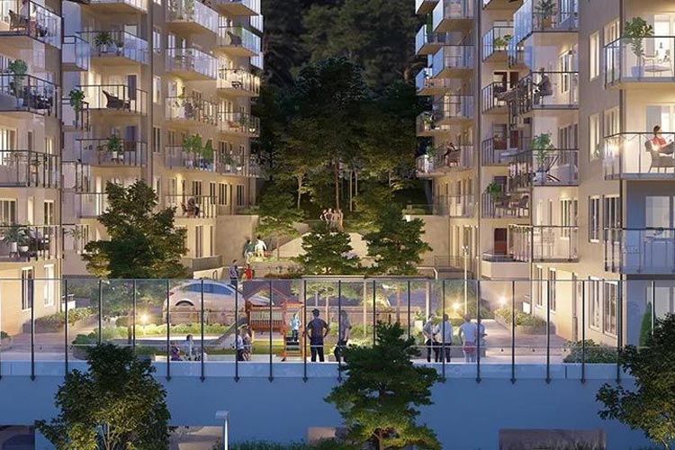 Flerbostadshus med moderna balkonger och entrépartier med säkerhetsdörrar